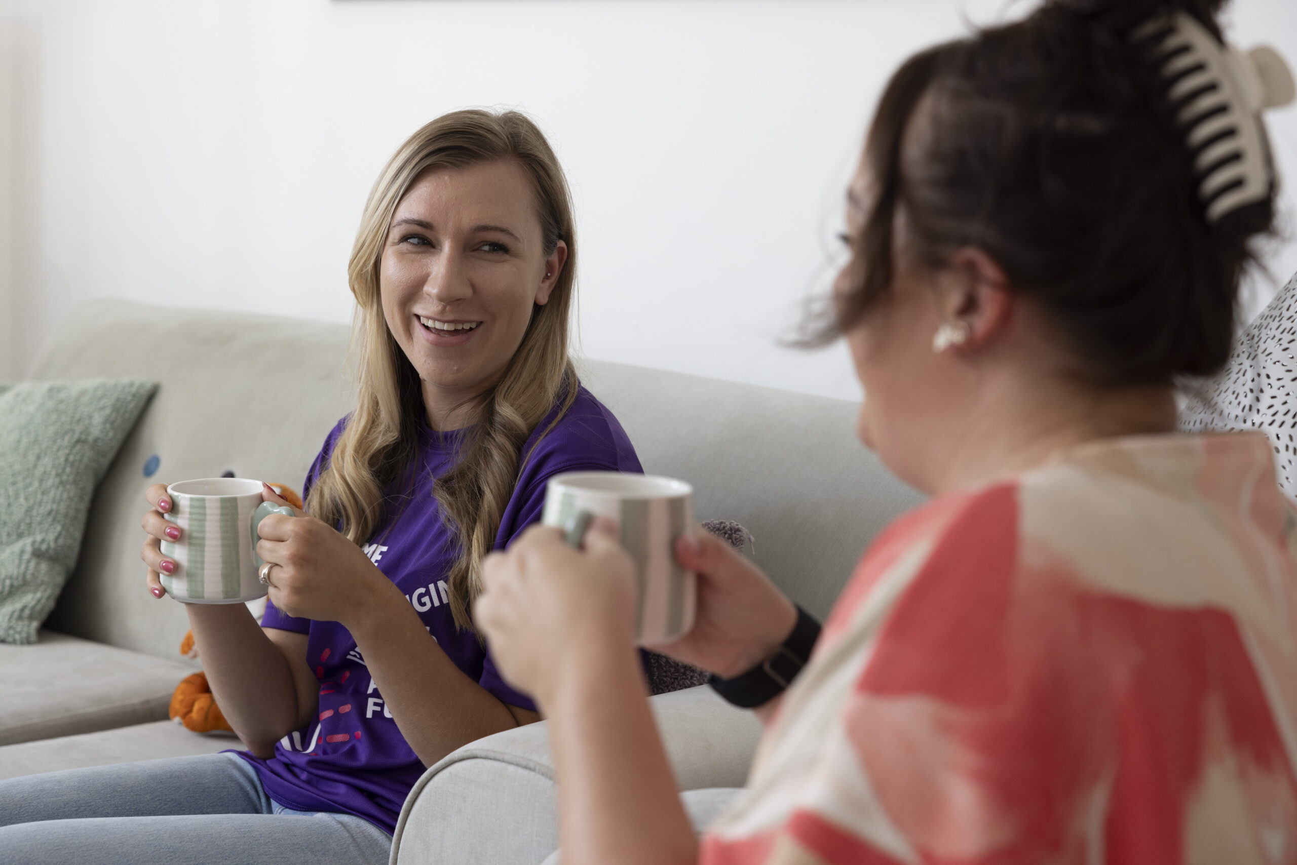 Home-Start volunteer talking to a parent